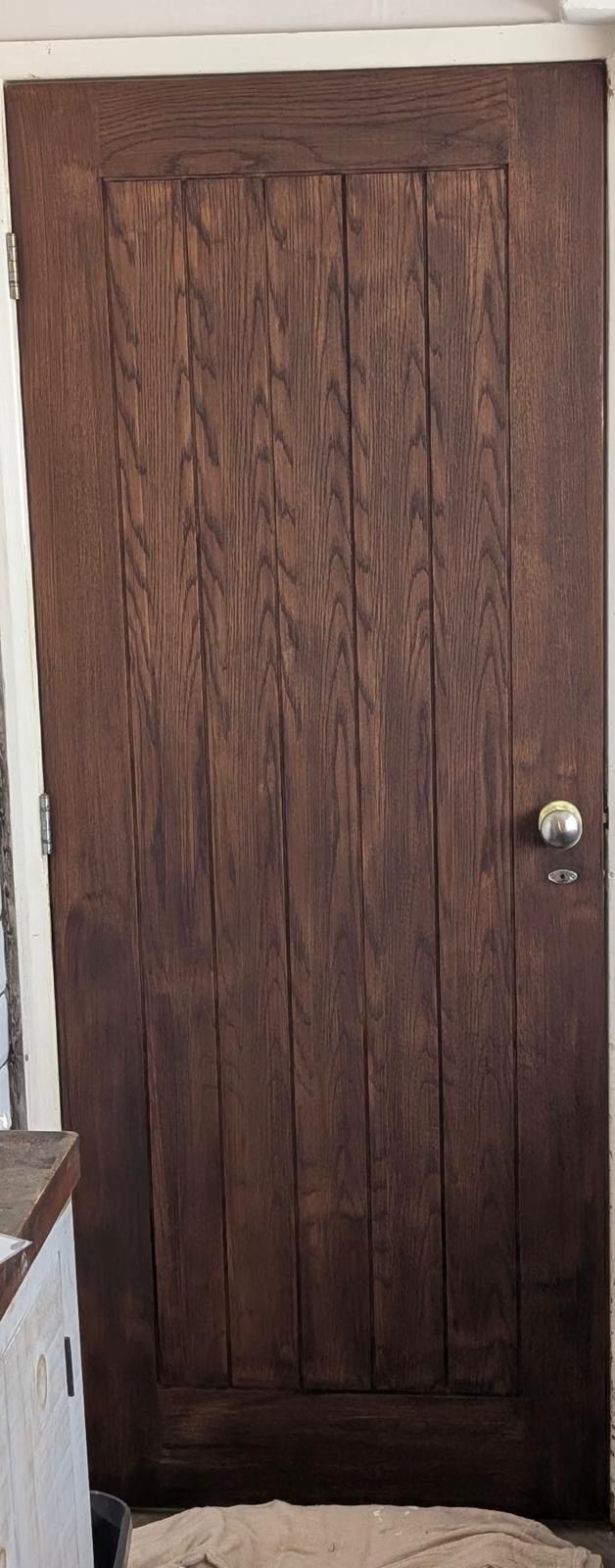 Oak door with dark wood stain finish