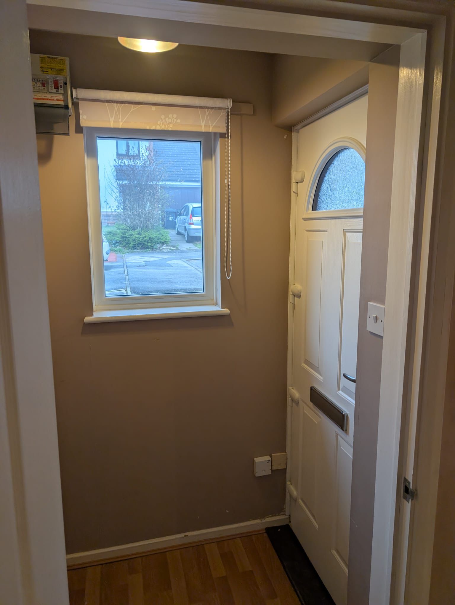 Hallway entrance painted in warm mocha tones