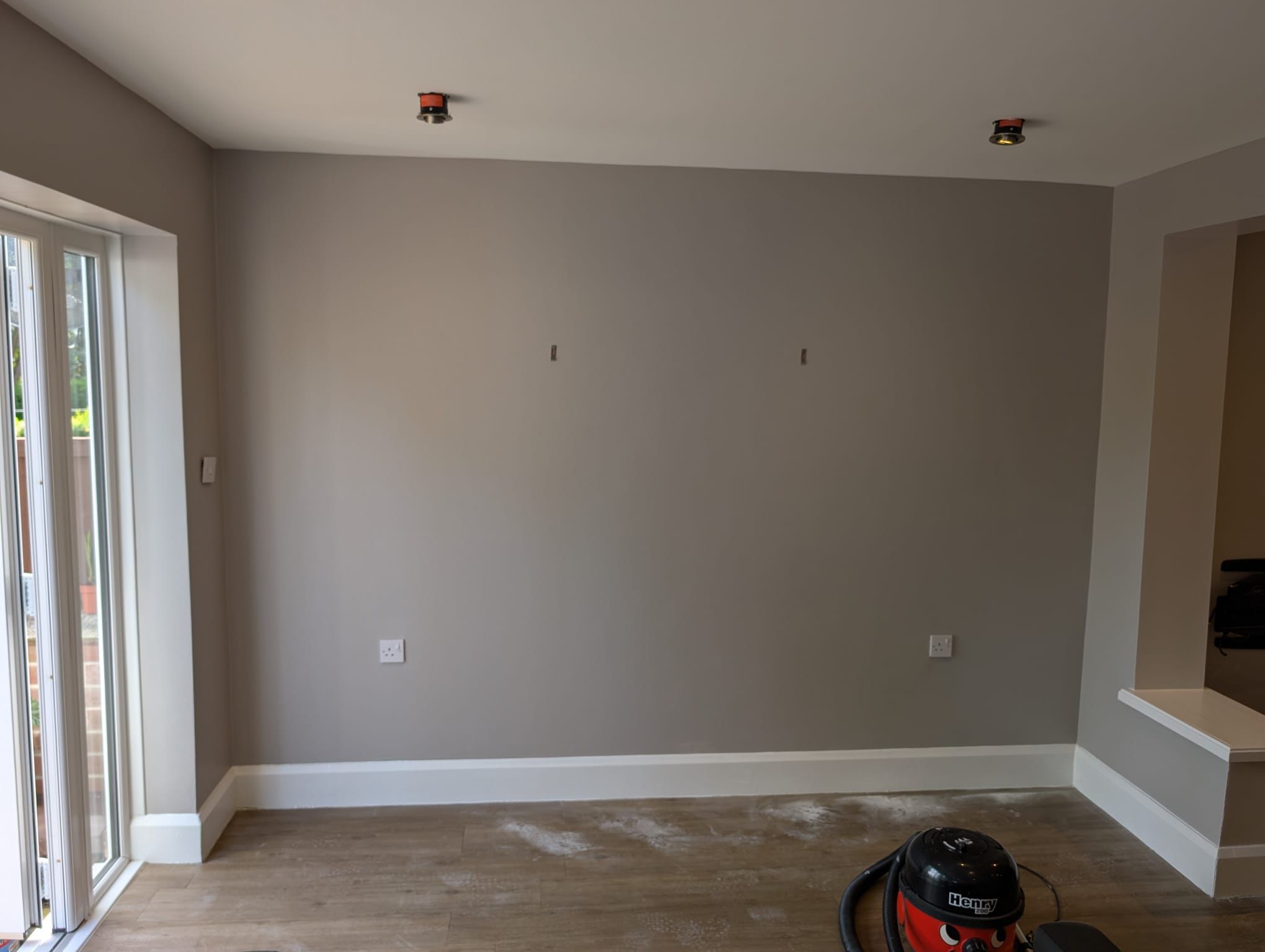 Finished living room with warm painted walls