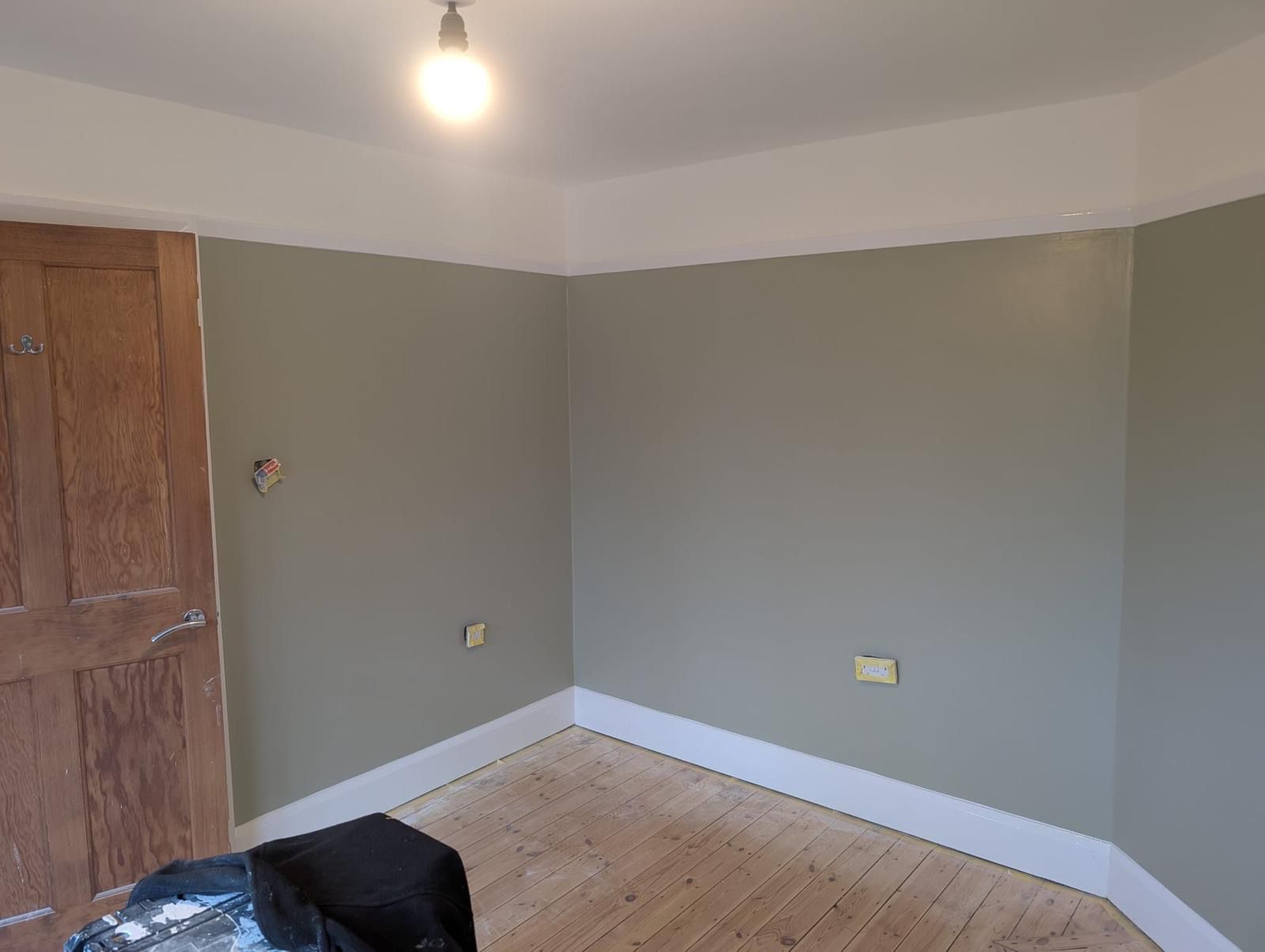 Room decorated in sage green by JSC