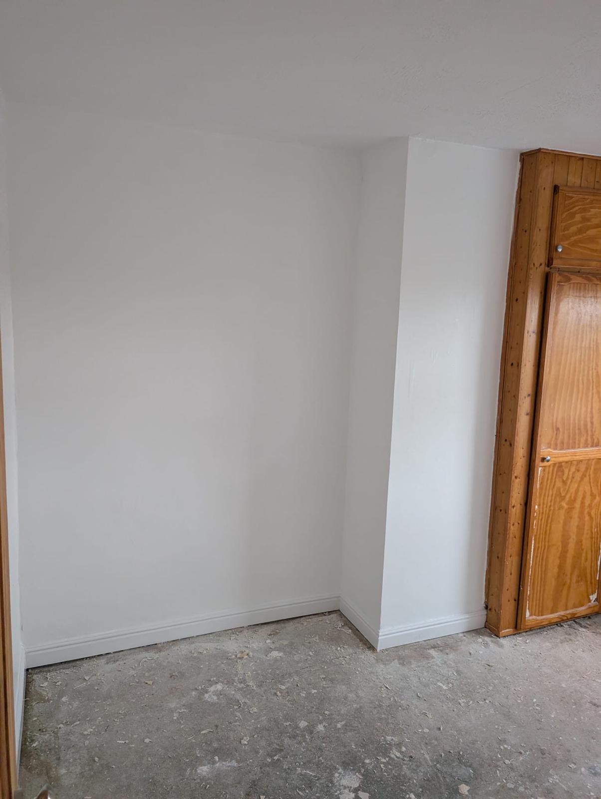 Freshly painted white walls with clean finish
